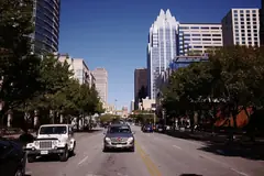 Congress Avenue in downtown Austin with the Texas State Capitol dome at the end of the street